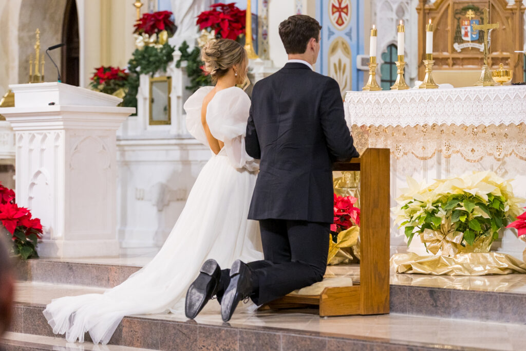 bride and groom at the altar